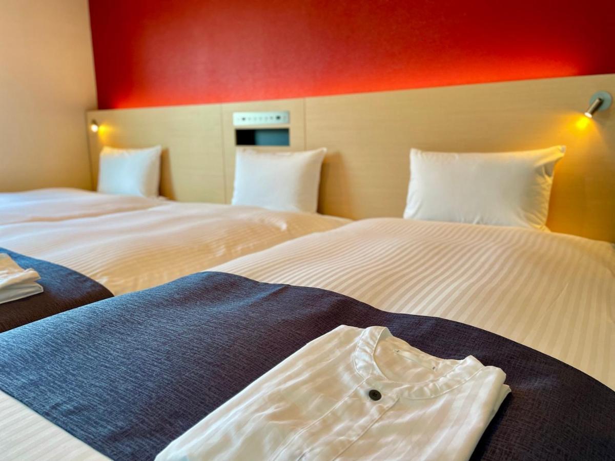 Chambre Triple - Vue sur Ville