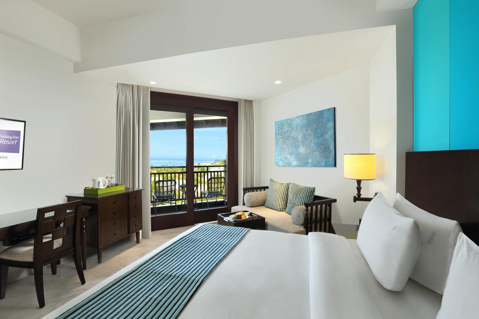 Premium Zimmer mit Kingsize-Bett und seitlichem Meerblick