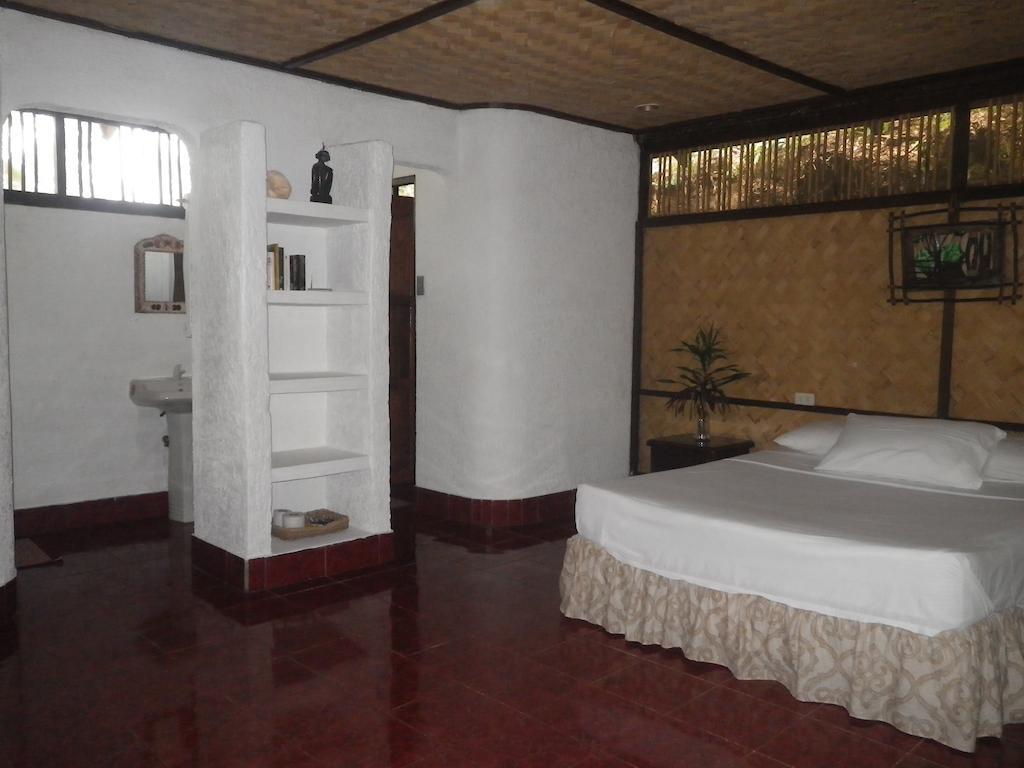 Native Island Family Cottage - Fan Room with Free Round Trip Boat Transfers from Lualhati Park,645676080:JPEG