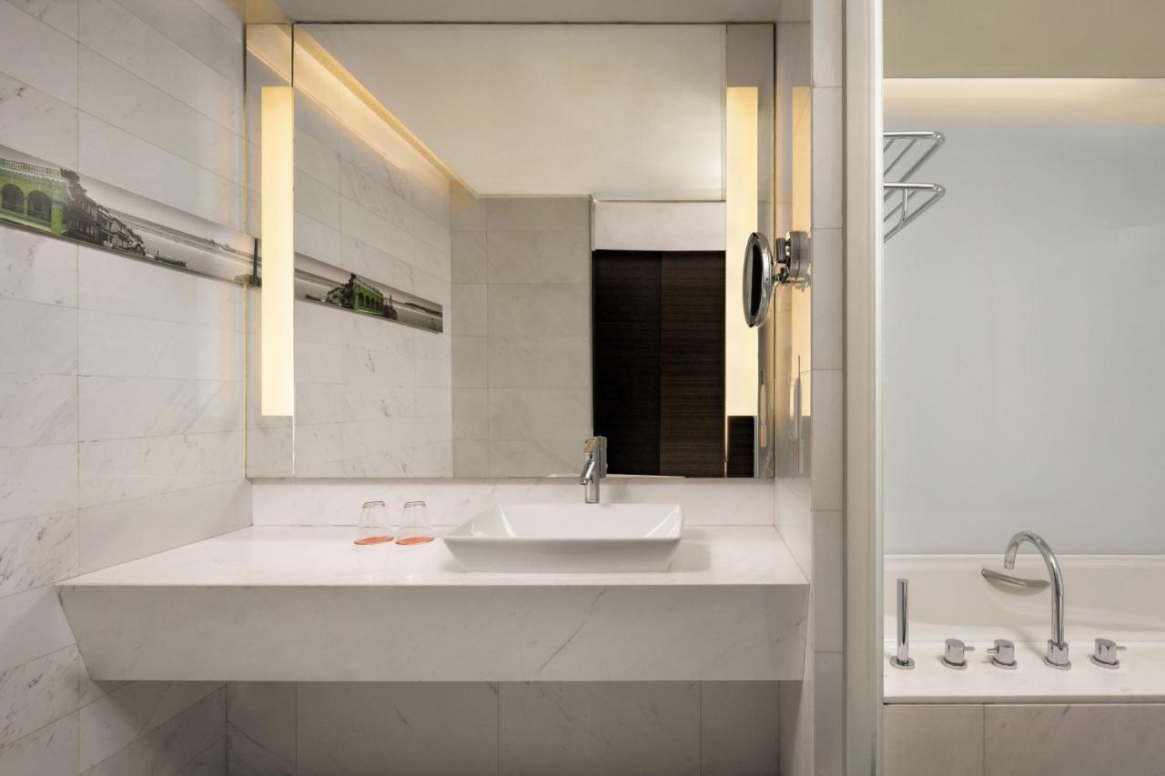 King Bed Room with Balcony, Courtyard View,1416306648:JPEG