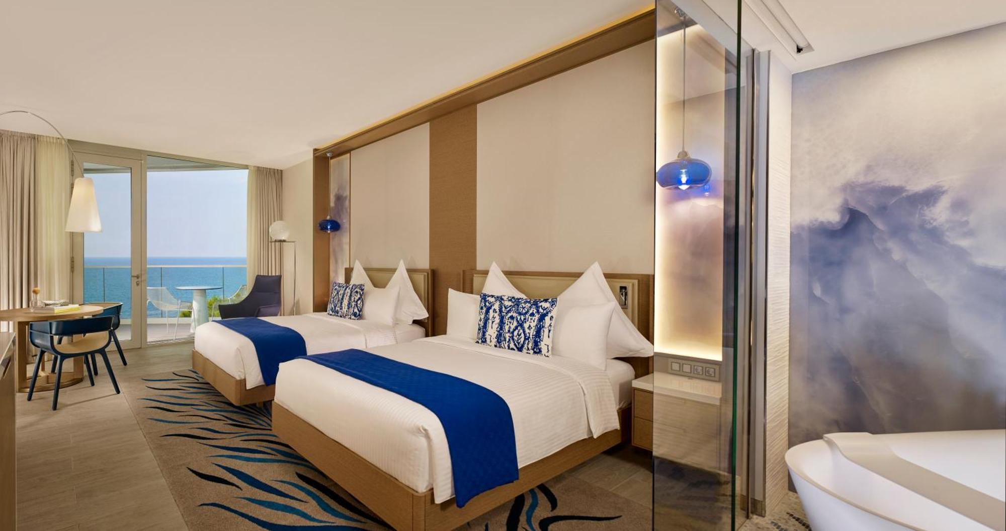 Deluxe Twin Room with Balcony and Partial Sea View,1550317609:JPEG