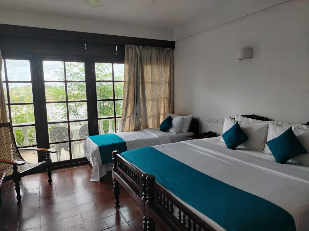 Deluxe Triple Room with Sea View,1717085352:JPEG