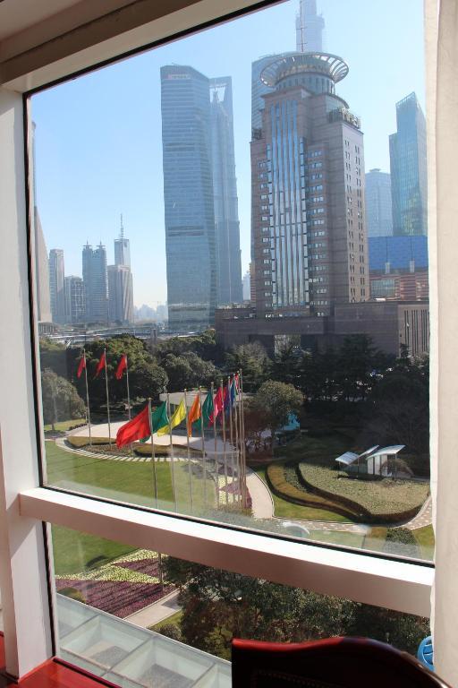 Quarto Superior com 2 Camas de Solteiro e Vista do Jardim