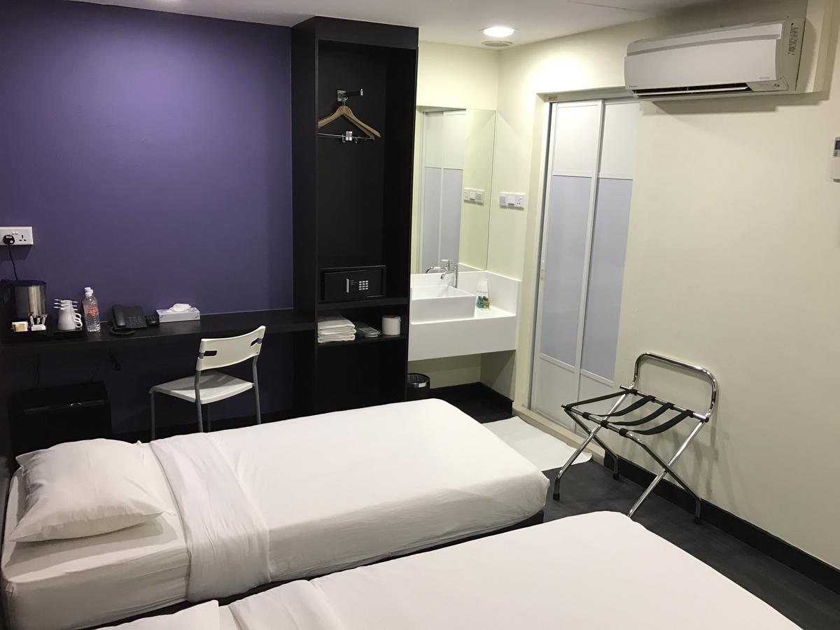 Quarto Triplo Standard (Sem Janela)