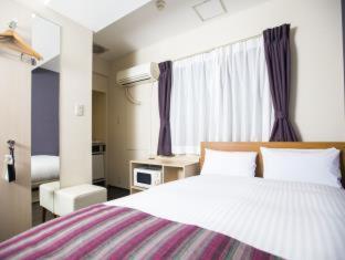 Double Room with Small Double Bed - Non-Smoking - House Keeping is Optional with Additional Cost,704366491:JPEG