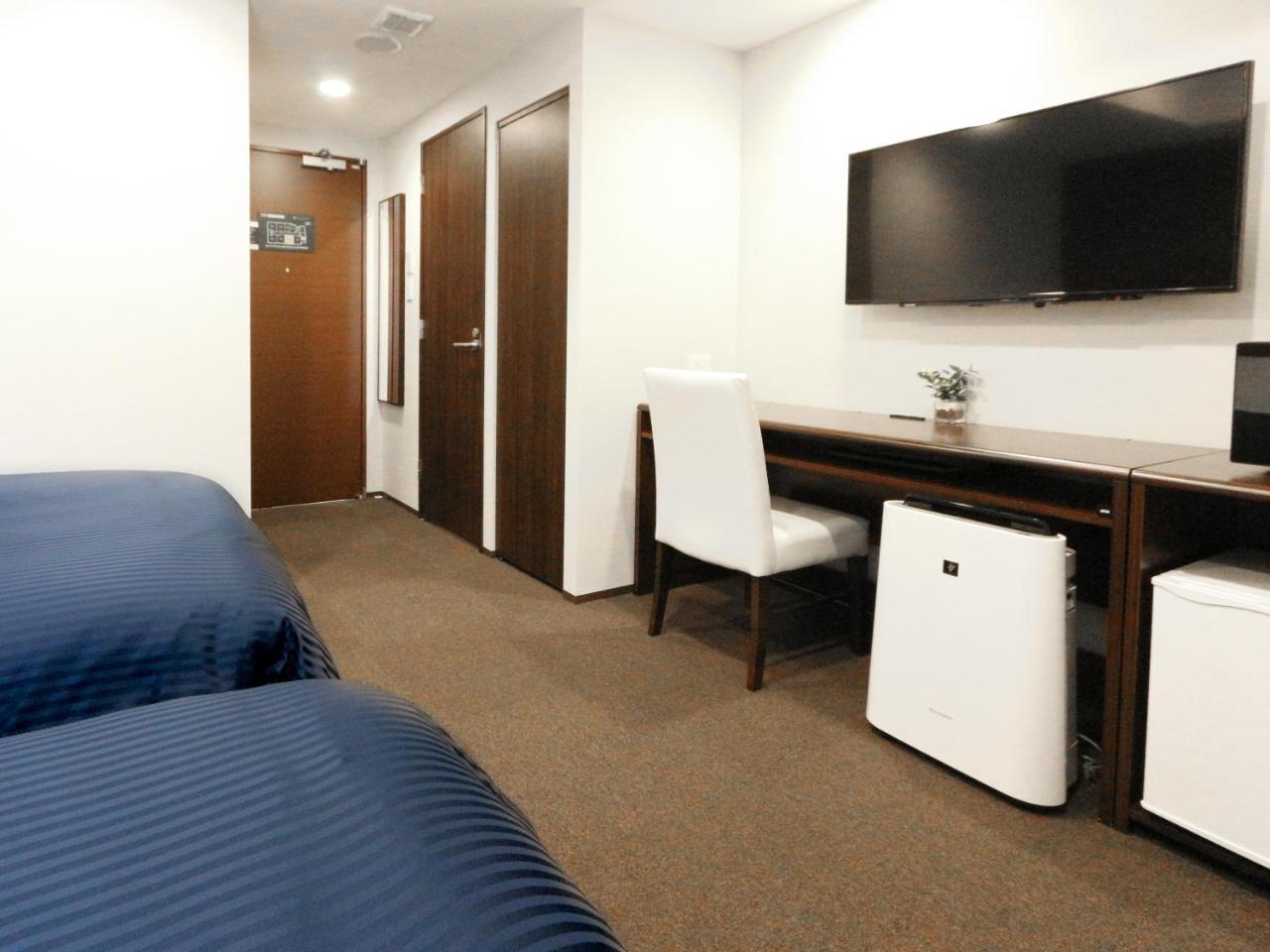 Quarto com 2 Camas de Solteiro - Fumantes